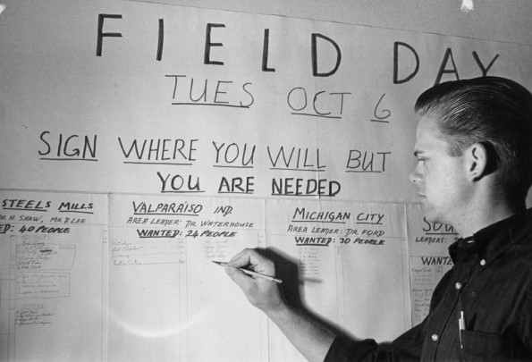 [A student signing up for an assignment for Ingathering Field Day]