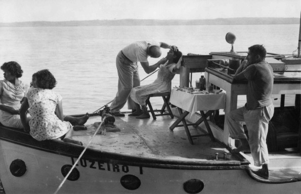 [Walter Streithorsh treating the sick on his launch on the Amazon River]