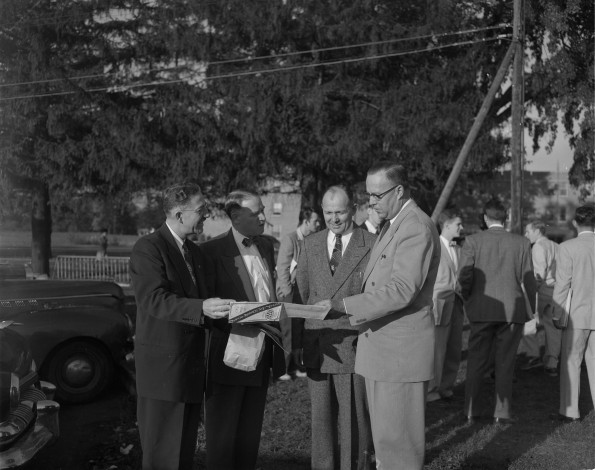 Ingathering leaders looking over routes and regions