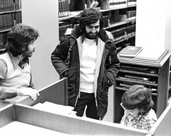 [Students in the seminary stacks of the James White Library at Andrews University]
