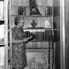 [Mary Jane Mitchell examining the Courville Collection given to the James White Library]