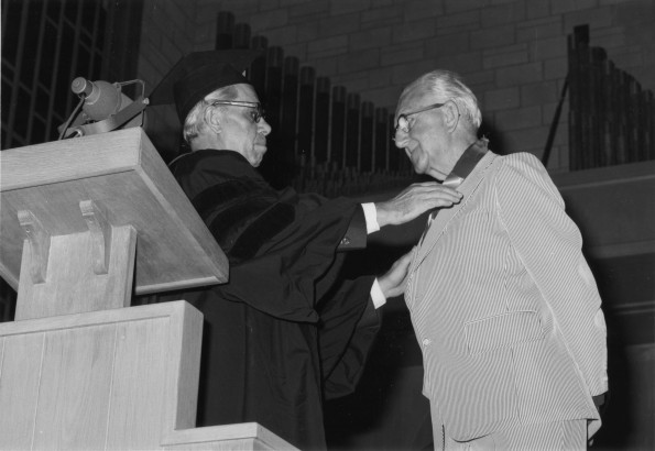 [Sidney W. Tymeson receives the Medallion of merit award from Walton J. Brown]