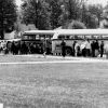 [Pathfinders loading buses for a weekend of camping by Lake Allegan]