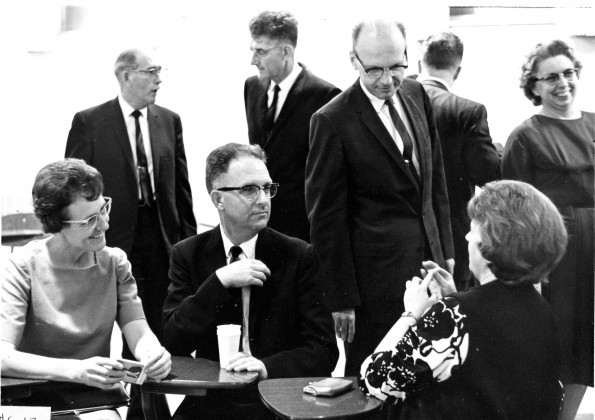 Alumni of Andrews University having a chat with Warren Becker at Homecoming