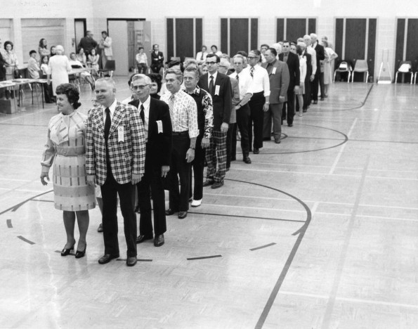 [Alumni marching at homecoming]