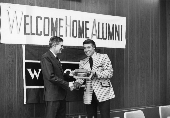 [Wilson L. Trickett hands an award to Don Prior at the Andrews University Alumni Association weekend, 1973]