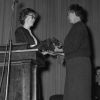 [Bonnie Jean Hannah is presented with a thank you gift for her help with the 1966 Andrews University yearbook, the Cardinal]