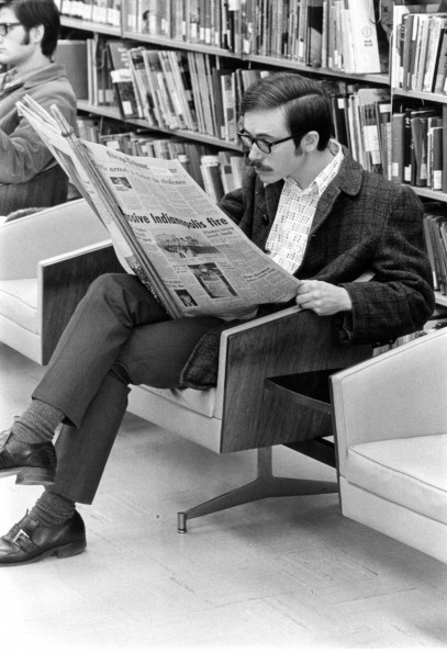 [A student reading in the James White Library]