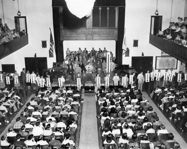 [Displaying ingathering goals acheived in the West Hall Auditorium]