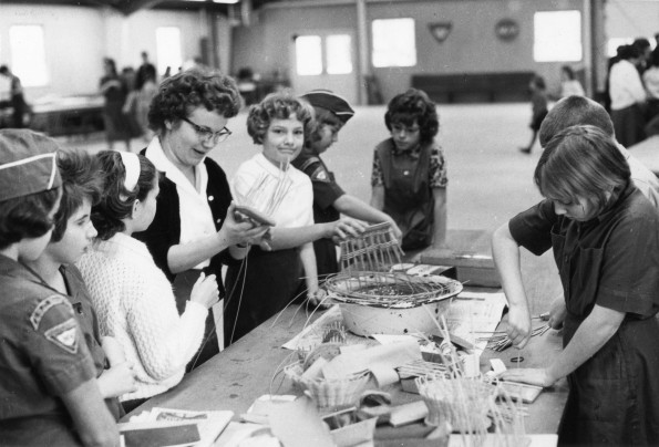 [Pathfinders learning to do basket weaving]