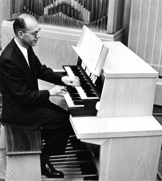 [C. Warren Becker plays the organ]