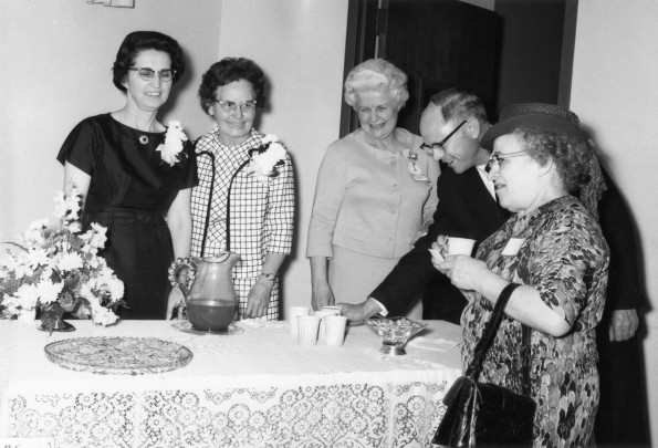 Richard L. Hammill and some ladies at an Andrews University Homecoming meeting