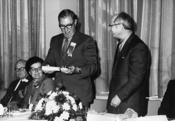 [James S. Barclay and his wife with Richard Hammill during Andrews University's 1971 alumni homecoming]