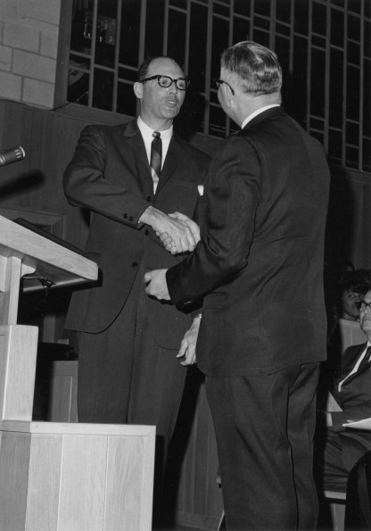 [Charles Perrault presents the organ keys to H. A. Morel at the organ dedication in Pioneer Memorial Church]
