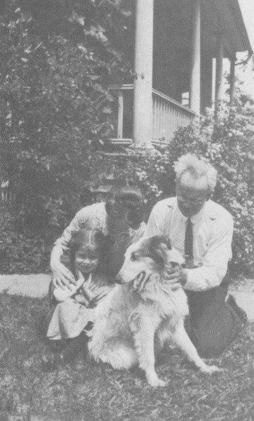 E. J. Waggoner with his daughter Bessie, granddaughter Verna, and the family dog