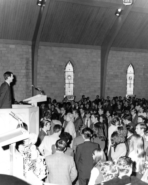 [Mike Stevenson speaks to the congregation of Pioneer Memorial Church]