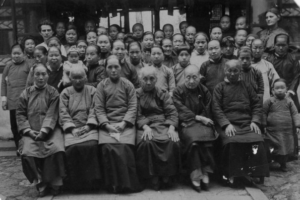 Group of Chinese people with two westerners
