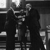 [Pastor Clarence Powers (?) receiving an award from Dr. Hammill during Andrews University's 1973 alumni homecoming]