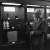 [Siegfried Horn displaying a statue in the Andrews University Archaeological Museum]