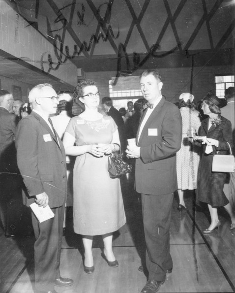Andrews University alumni mingle and talk during Homecoming weekend of 1960