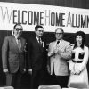 [Wilson L. Trickett yields the office of Alumni Association president to Floyd Costerisan at Andrews University's 1973 homecoming]