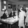 Andrews University alumni register in Johnson Gymnasium lobby during Homecoming 1960