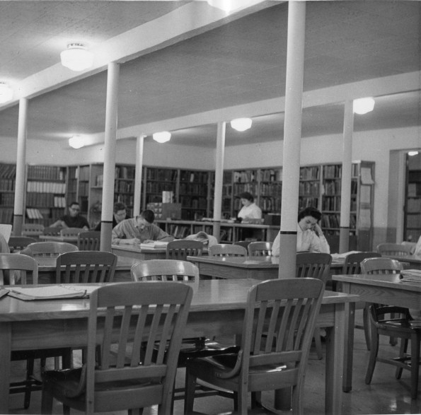 [Students studying in Emmanuel Missionary College library]