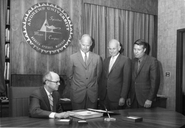 [Andrews University president Richard Hammill with Robert Upton and Lester Tiscornia at the conclusion of a $1 million fundraiser for the University's science complex]