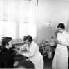 [Nurses taking vitals at Emmanuel Missionary College Medical Clinic]