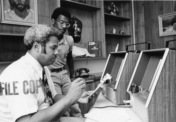 [E. Wayne Shepperd demonstrating new audio-visual equipment]