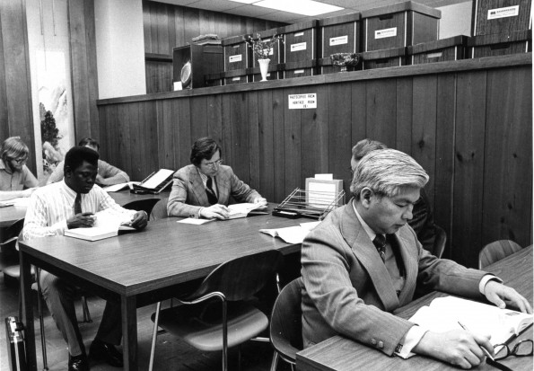 [Sakae Kubo studies at the James White Library]