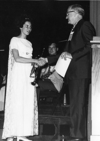 [Adelphia Hill receives an award]