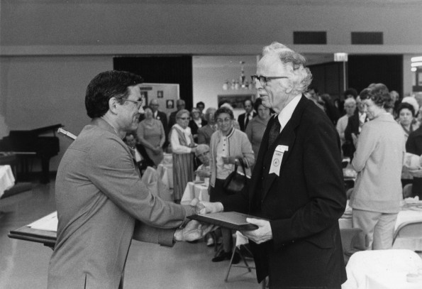 [Horace John Shaw presents awards to distinguished alumni]