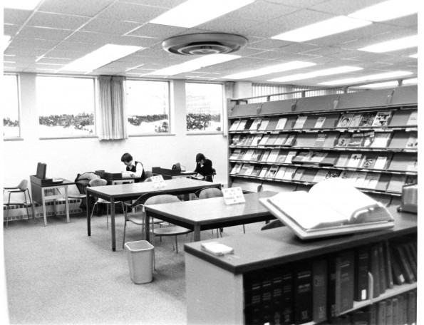 [James White LIbrary patrons at work in the periodicals section]