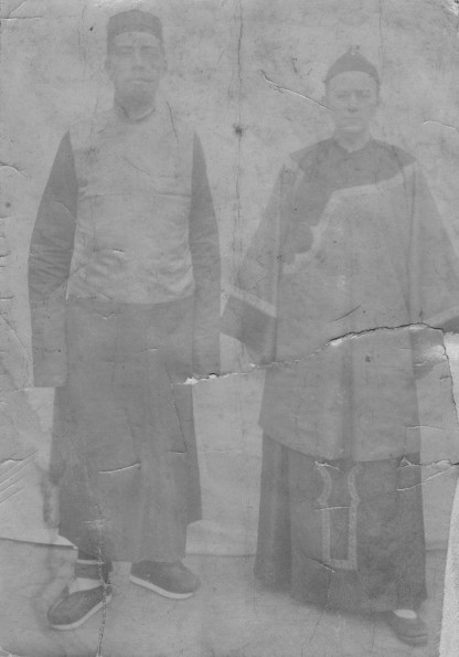 Harry Miller and his wife wearing Chinese traditional clothes