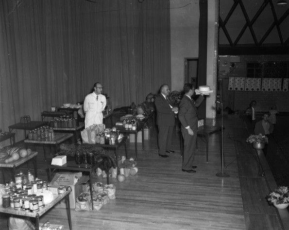 A bake sale to raise funds for ingathering in the Johnson Gymnasium Auditorium]