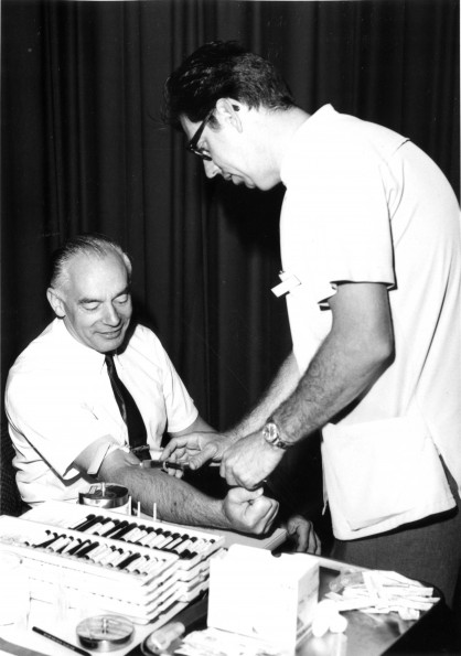 [Leonard Standen participates in the Christian Youth Action health screening initiative]