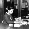 [A student worker in the James White Library]