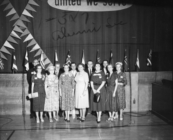 Group photograph of some of the attendees at the Andrews University alumni Homecoming weekend of 1960
