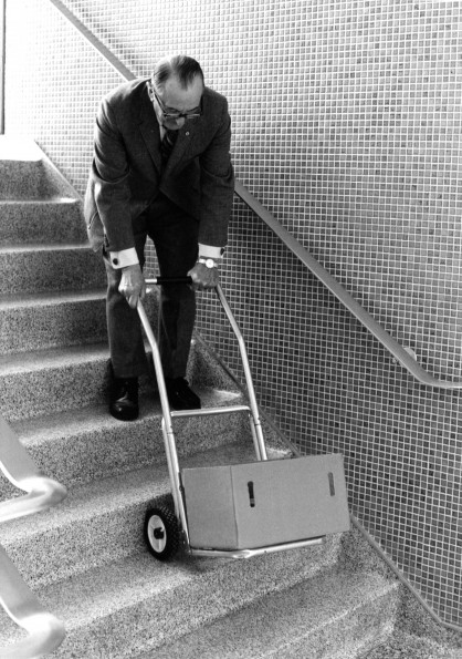 [Mark Bovee bringing bricks from Battle Creek College to the Andrews University Alumni Office]