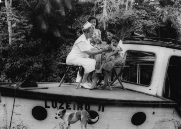 Nurse Jessie Halliwell working on the deck of the Luzeiro II on the Amazon River