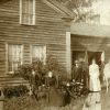 [Kimble family in front of their home in Elmira, NY]