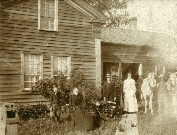 [Kimble family in front of their home in Elmira, NY]