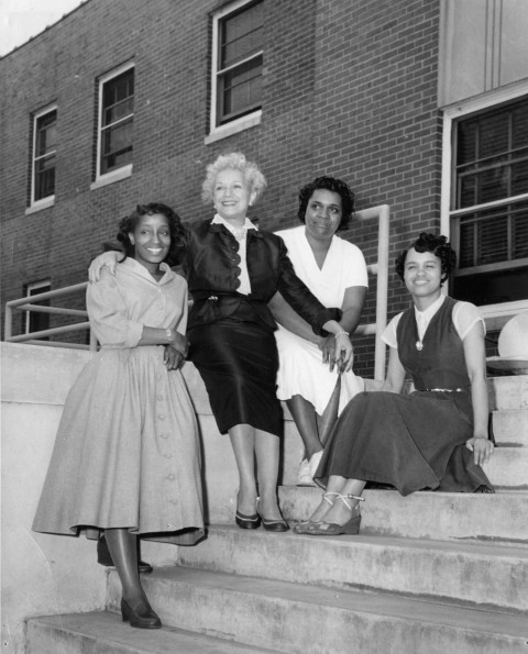 [Toki Schalk Johnson with three unknown girls at the Riverside Sanitarium]