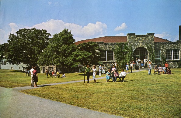 [People socializing in front of the Science Building at Madison College]