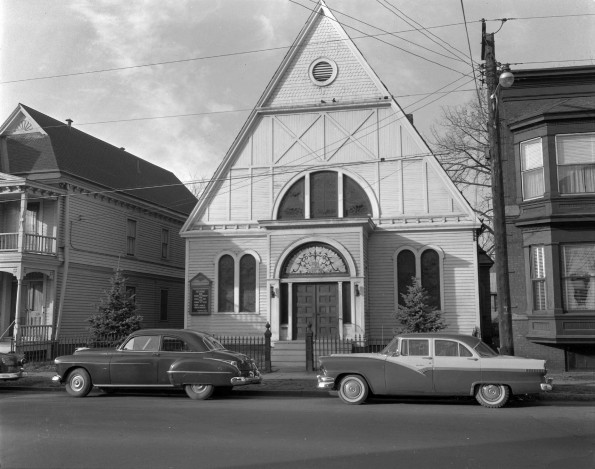 A horizontal view of Troy Church from across the street