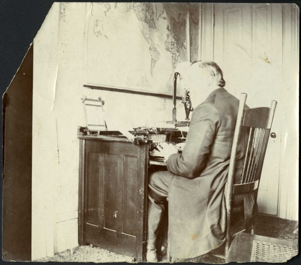 Uriah Smith at his desk in his study