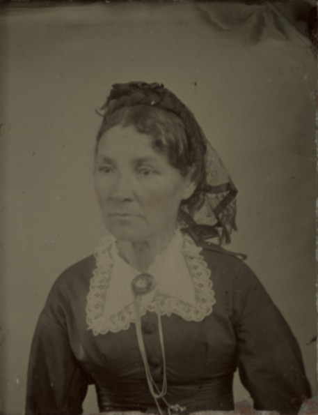 Older unknown woman with brooch