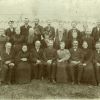 [New York ministers and officials at an unknown camp meeting]