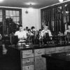 [Unknown students working in the Chemistry Lab at Madison College under the direction of professors James Rimmer and Perry Webber]